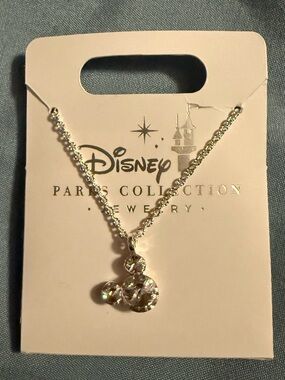 NWT Disney Parks jewelry. Small Mickey ears pendant on necklace